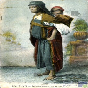 Tunis - bédouine portant son enfant